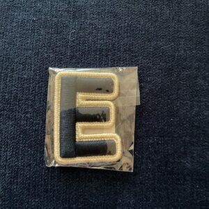 Stoney Clover Lane NWT rolled embroidery “E” in sapphire
